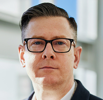 Direktør Alexander Hughes – CEO-portræt fra en kryptovaluta-handelsvirksomhed