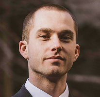 Portræt af Thomas Whitfield, ekspert og analytiker inden for kryptomarkedet
